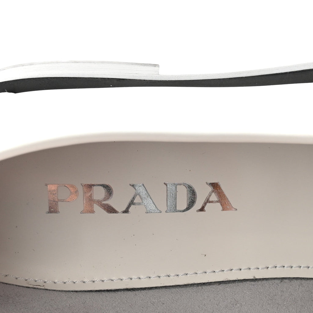Prada Spazzolato Metal Triangle Logo 20mm Women's Loafers White